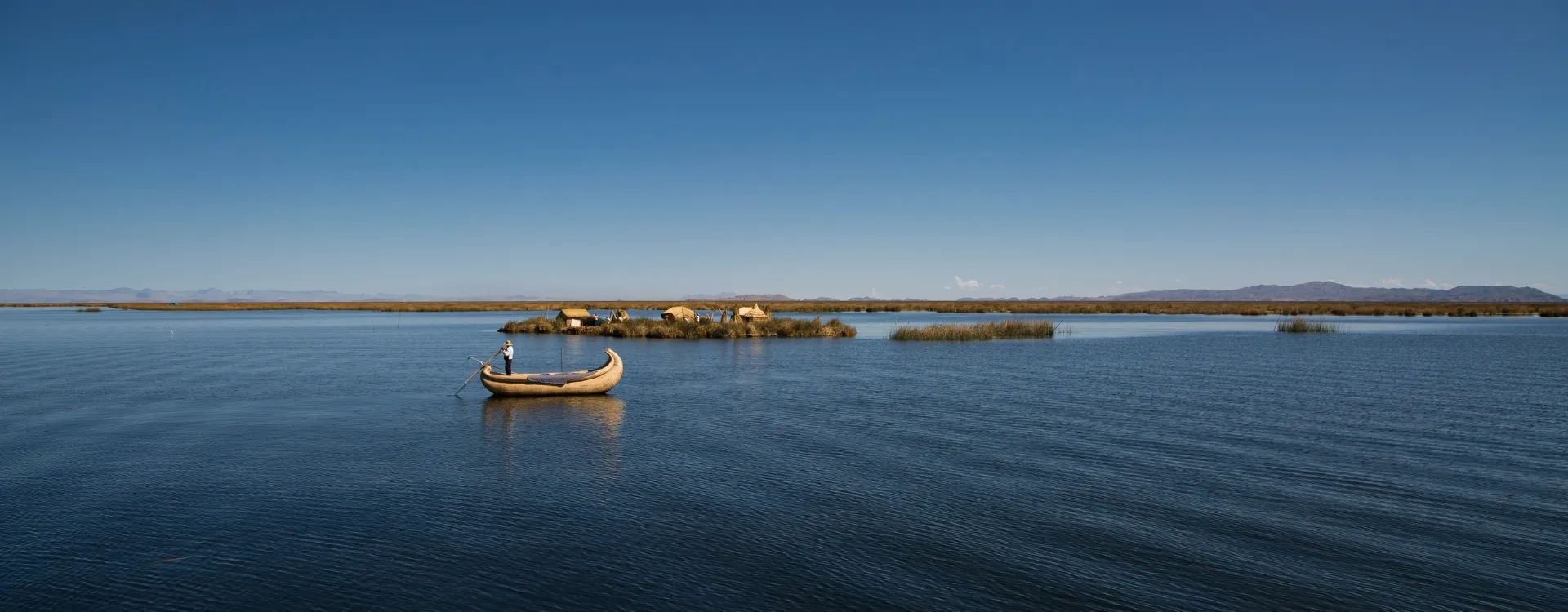 traditional boat on lake titicaca peru