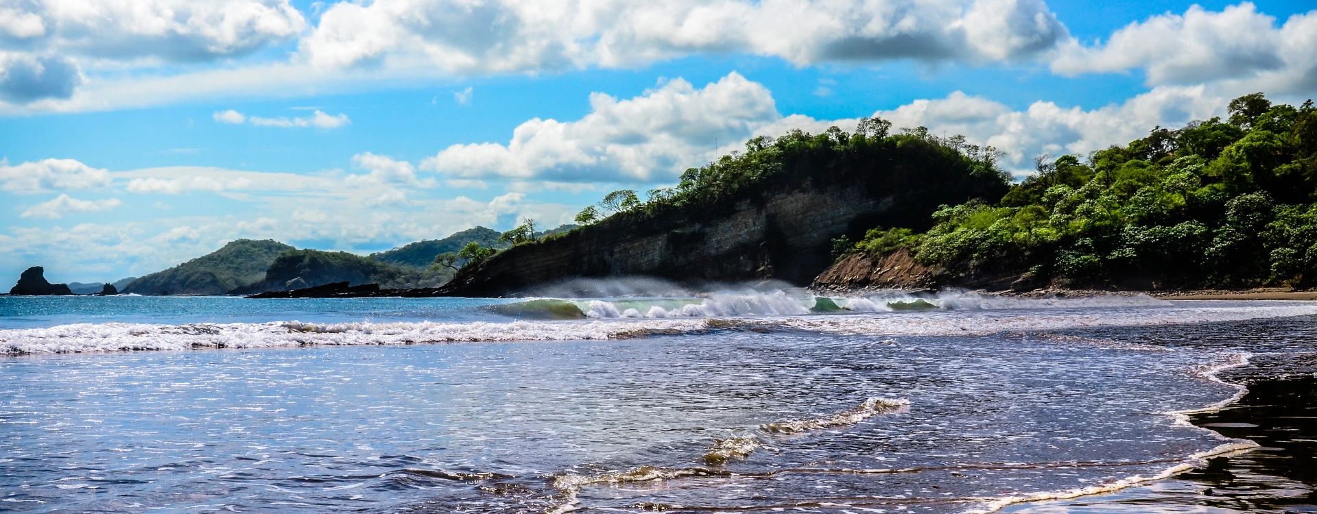 A beach on Nicaragua's pacific coast with jungle backdrop