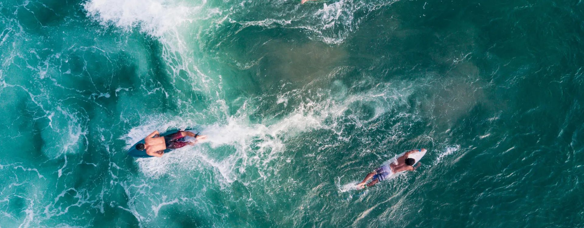 aerial image of surfers in bali