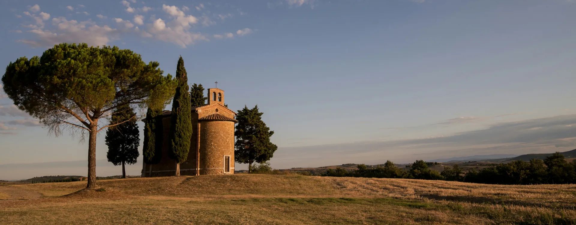 Old Italian ruin on a green pasture in Tuscany
