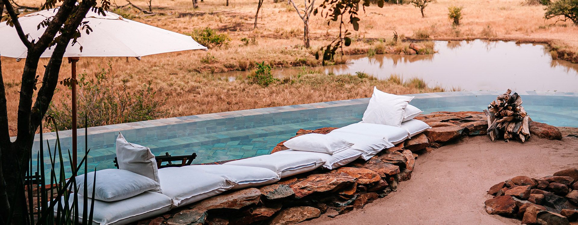Swimming pool and African Luxury Safari lodge terrace 