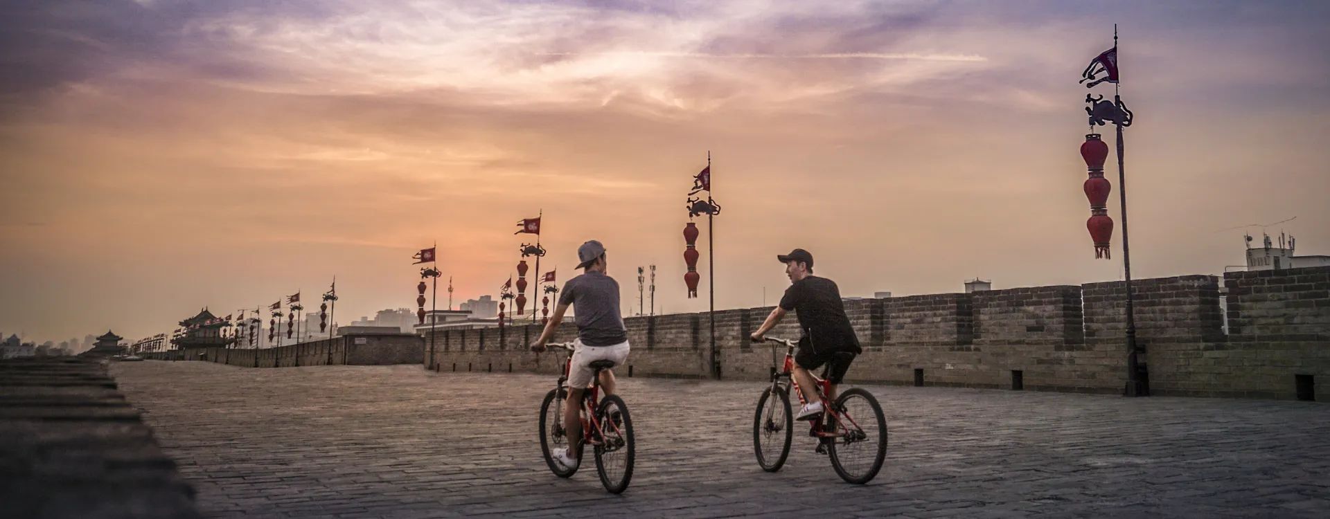 Two boys cycling in China, Luxury holidays in China