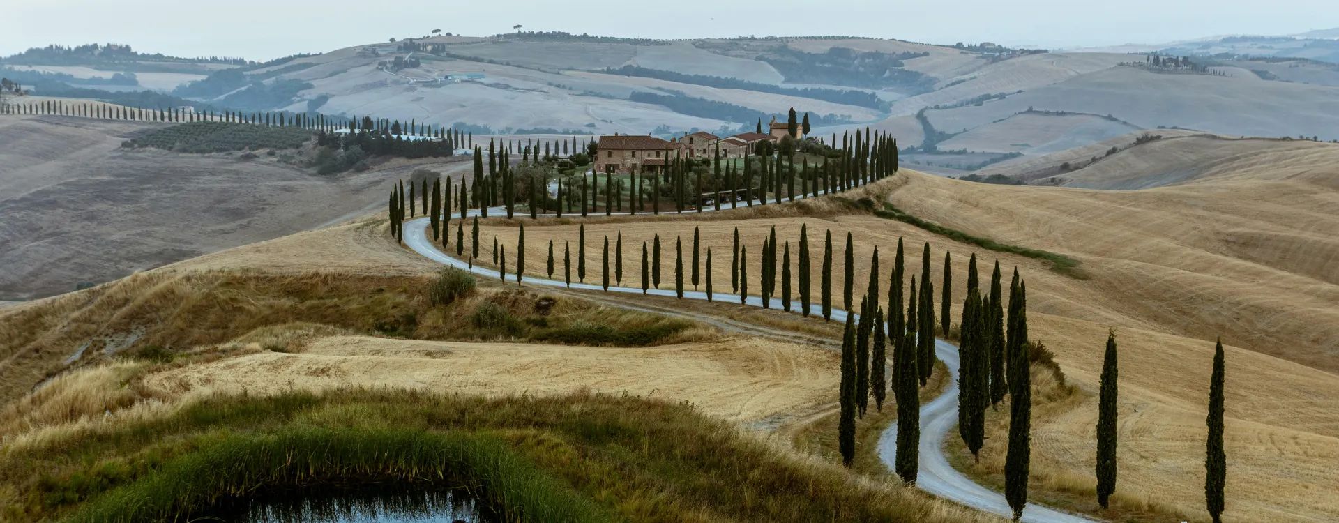A windy road through the Tuscan countryside