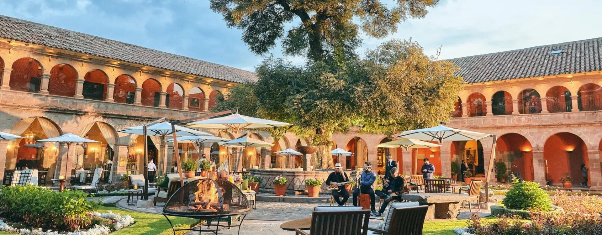 Belmond Hotel Monastario Cusco courtyard filled with musicians
