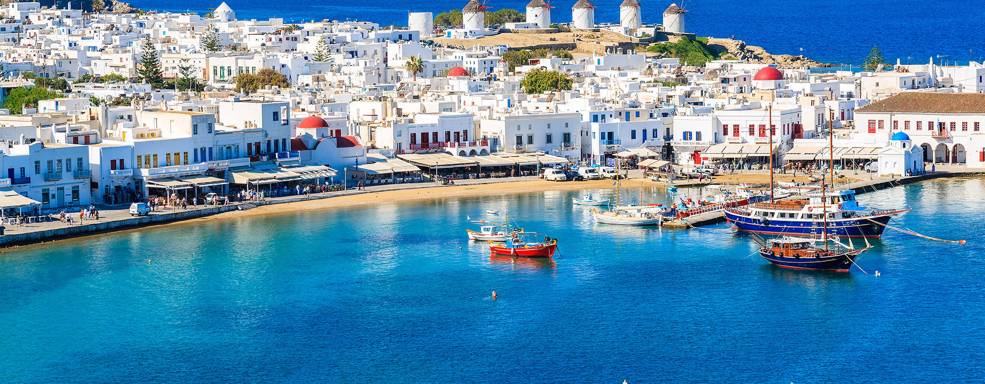 A view of Mykonos port with boats, Cyclades islands, Greece