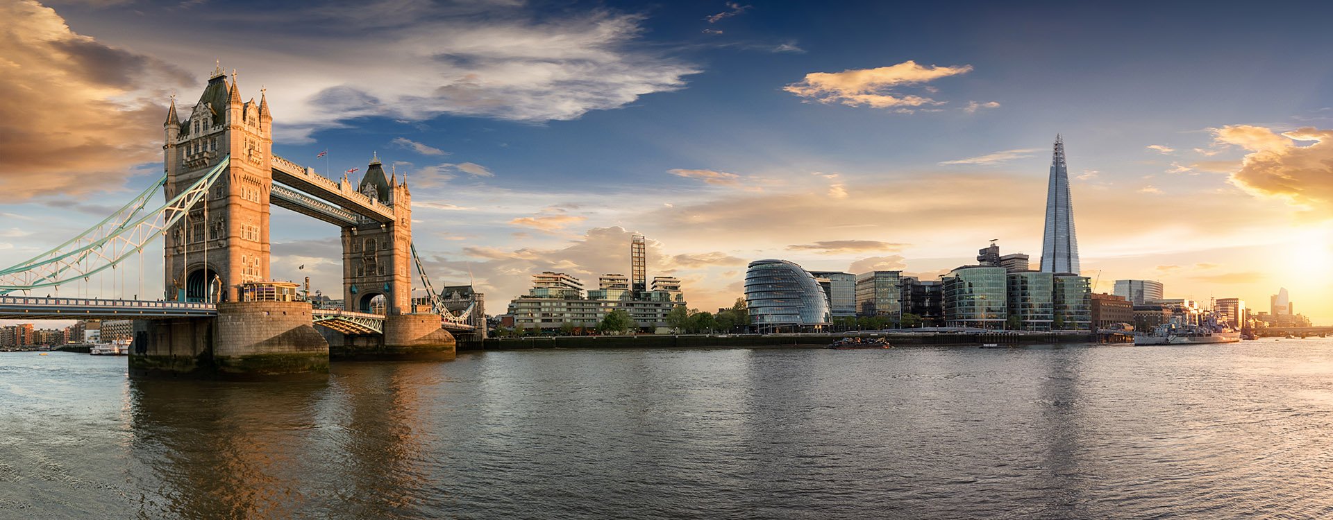 The skyline of London: from the Tower Bridge to London Bridge during sunset time, United Kingdom