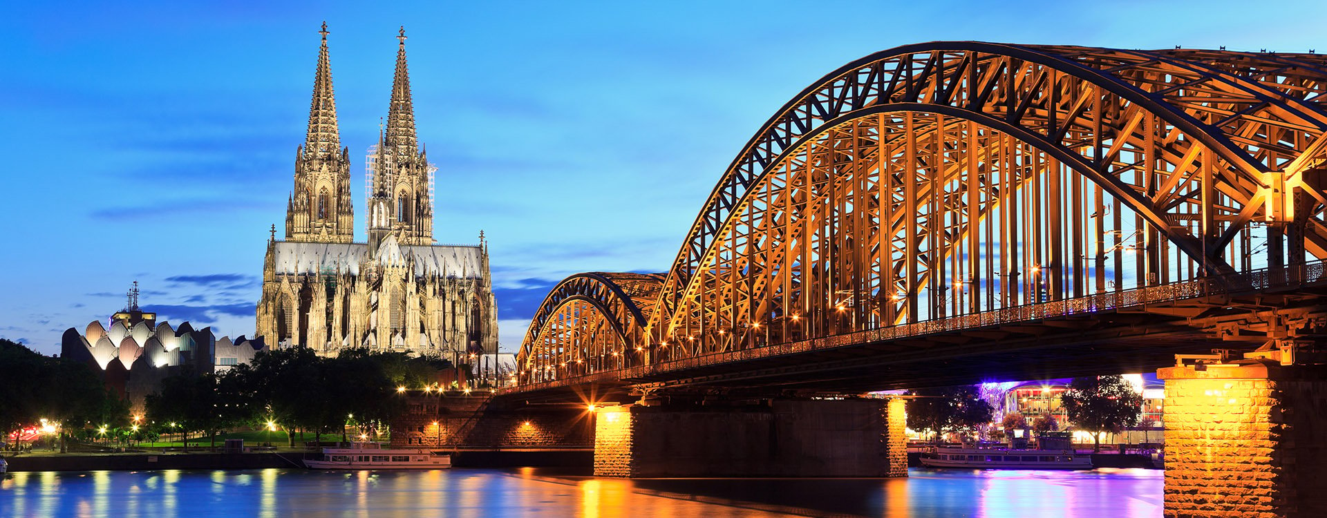 Cologne Dom and city skyline at night, Cologne, Germany