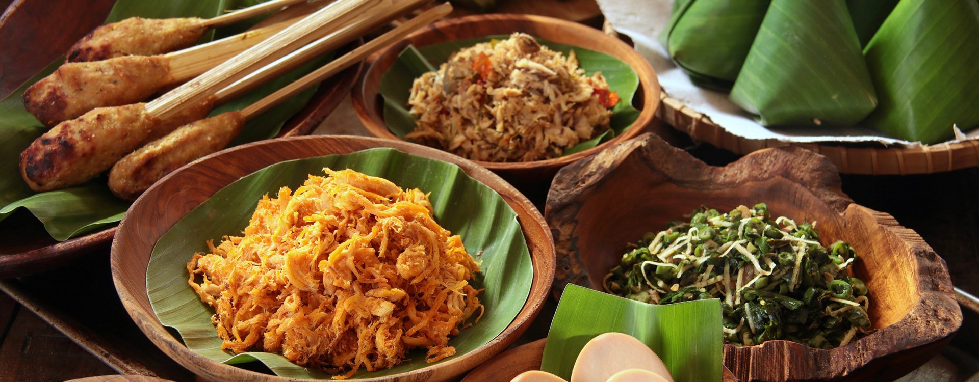 Nasi Jinggo. Balinese meal of rice and side dishes in small banana leaf parcels
