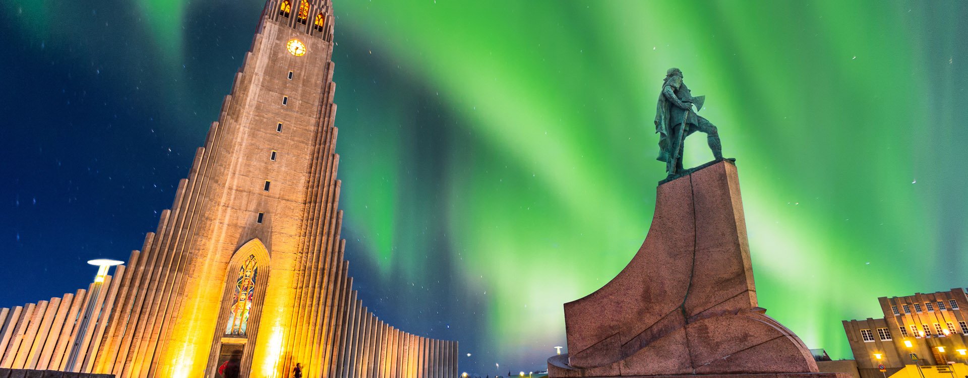 aurora borealis above hallgrimskirkja church in central of reykjavik city in Iceland