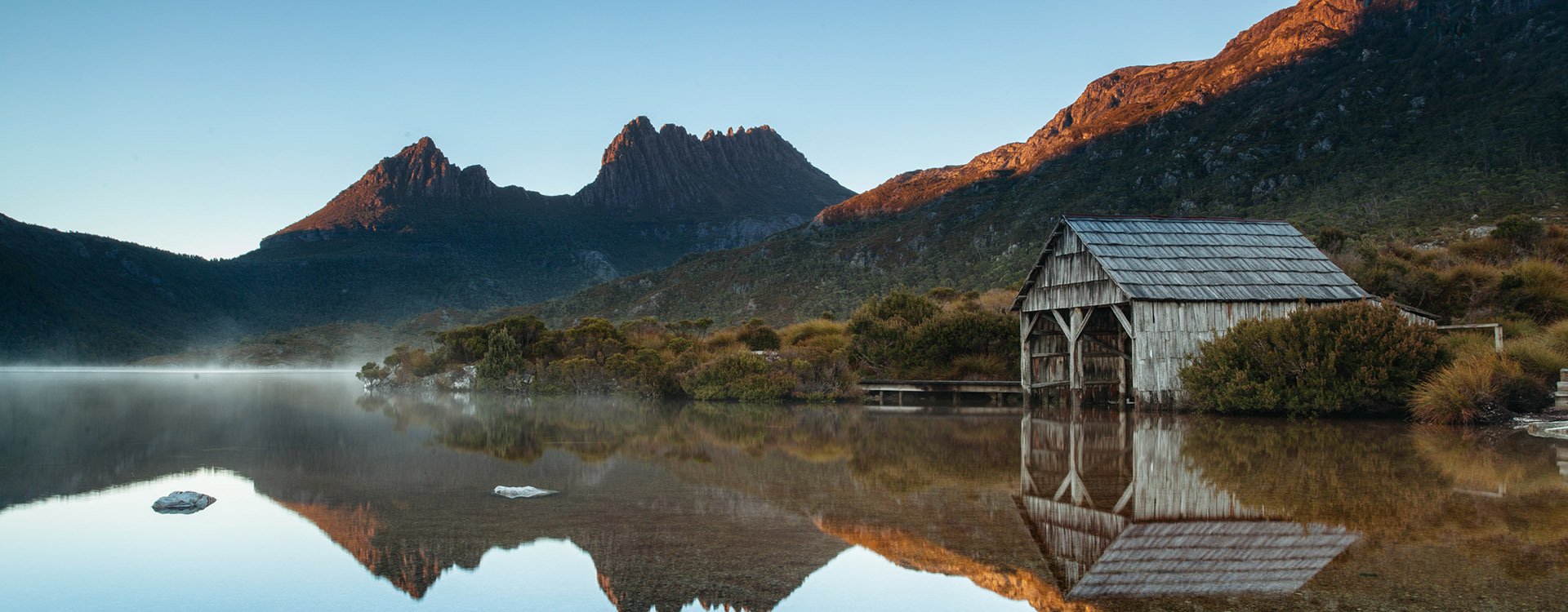 Mountain Cradlle National Park in Tasmania. Mirror reflections in peaceful still waters of lake Dove