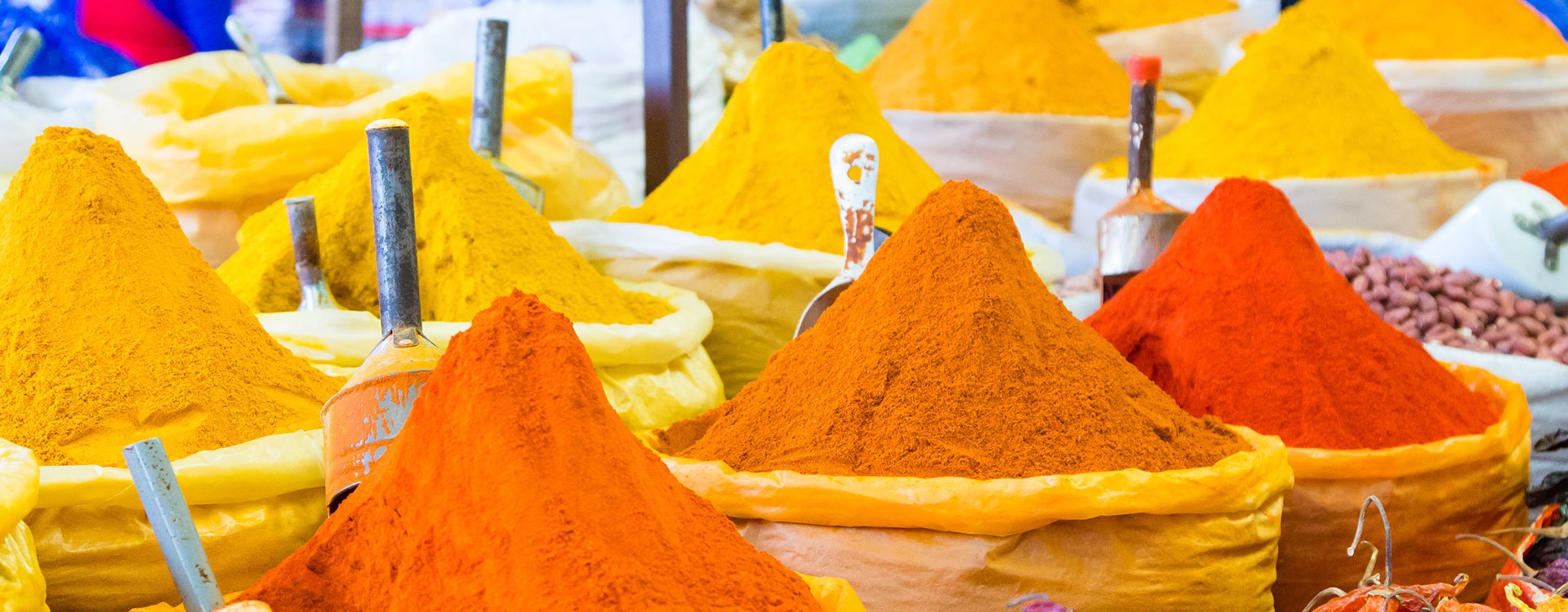 Colorful spices pyramids background. Sucre traditional market, Bolivia