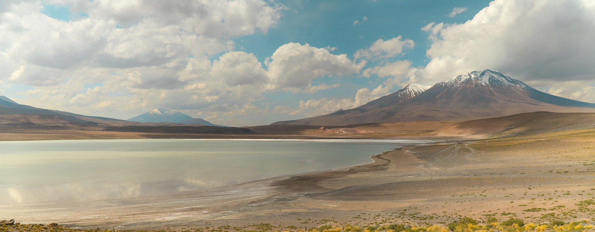 Dramatic mountain landscape wilderness. Dry, barren landscape with beautiful mountain background. Shot in Salt Flats of Uyuni, Bolivia