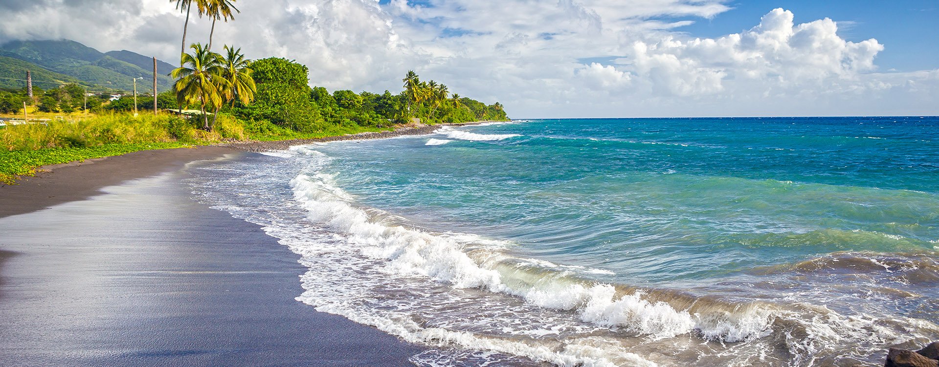 Beach on a St. Kitts island with black sand