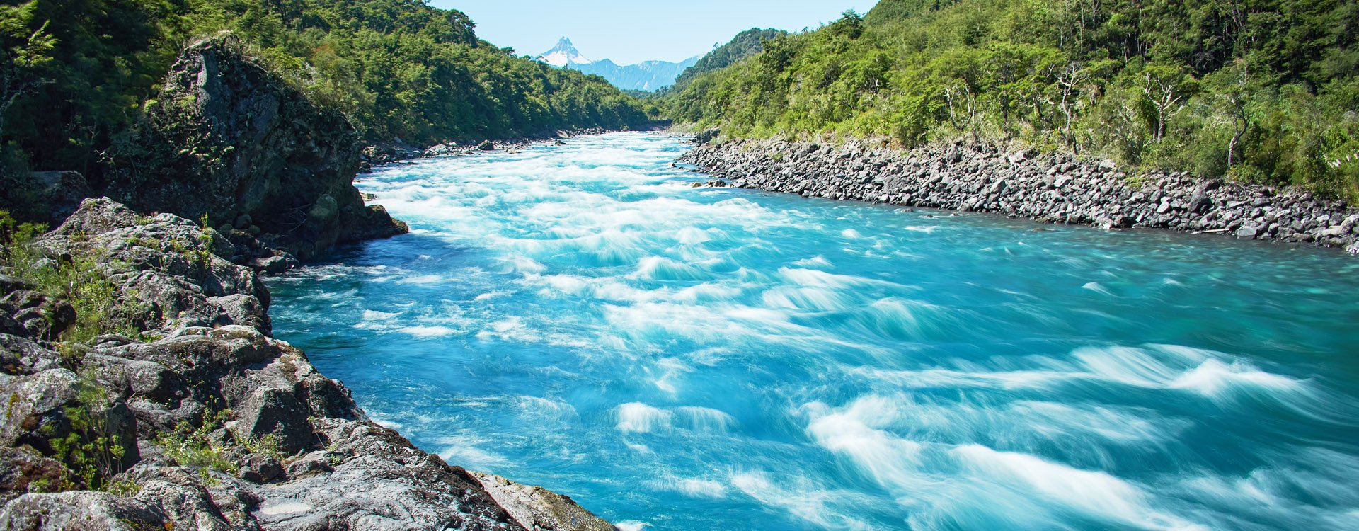 The waterfalls, rapids and tourists of Petrohue on a sunny day in the lake region of Chile, near of Puerto Varas