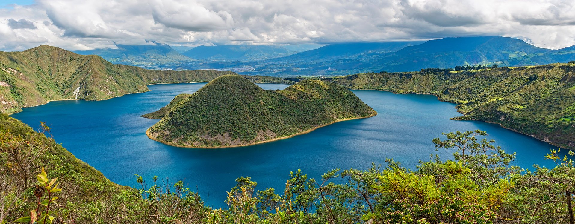 The Cuicocha crater lake or lagoon with the Teodoro Wolf and Yerovi islands near Otavalo, north of Quito, Ecuador