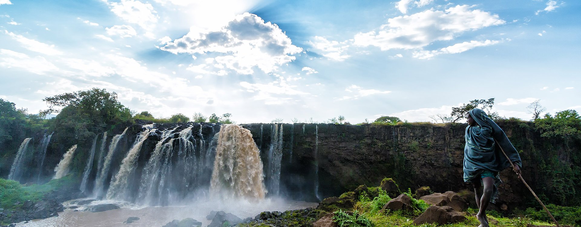 Bahir Dar, Ethiopia: A boy stares at the Blue Nile Waterfalls.