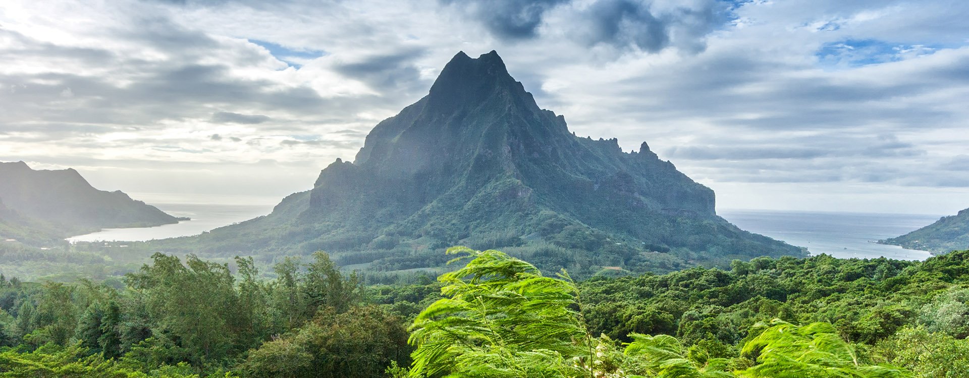 Amazing landscape of Tahiti, Polynesia. Mountains, forest and ocean