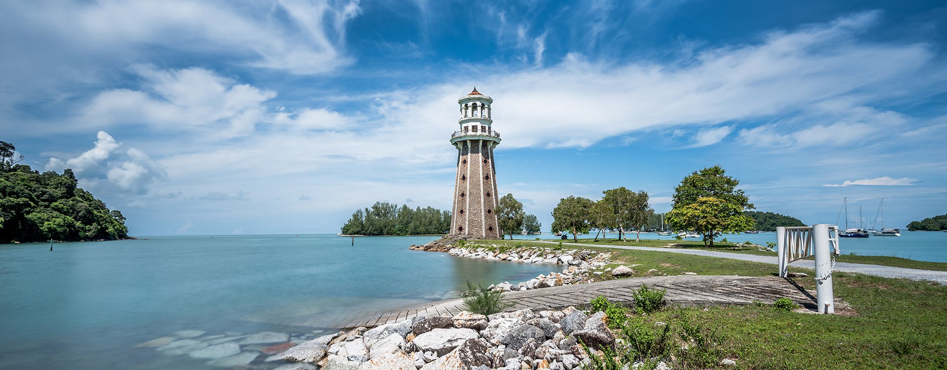 A Lighthouse on a sunny day with blue sky at Telaga Habour Park Langkawi, Langkawi Island