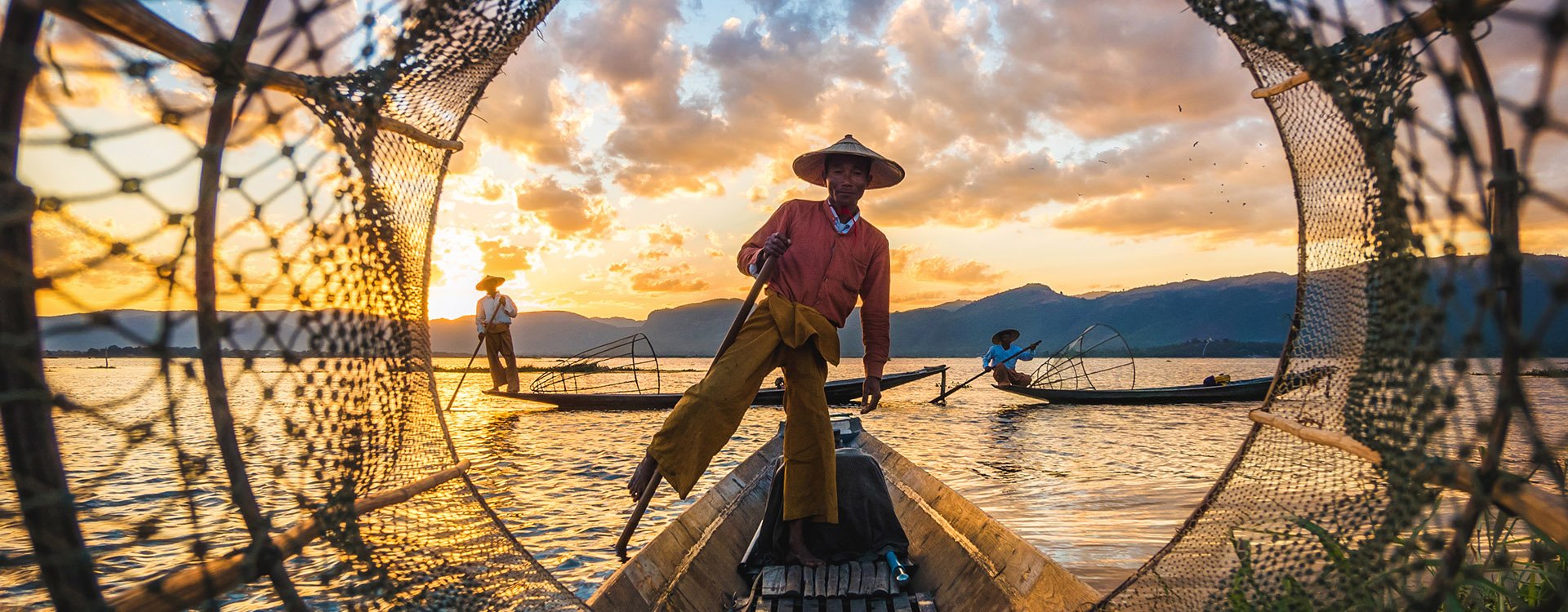 Inle Lake Intha fishermen at sunset in Myanmar (Burma)