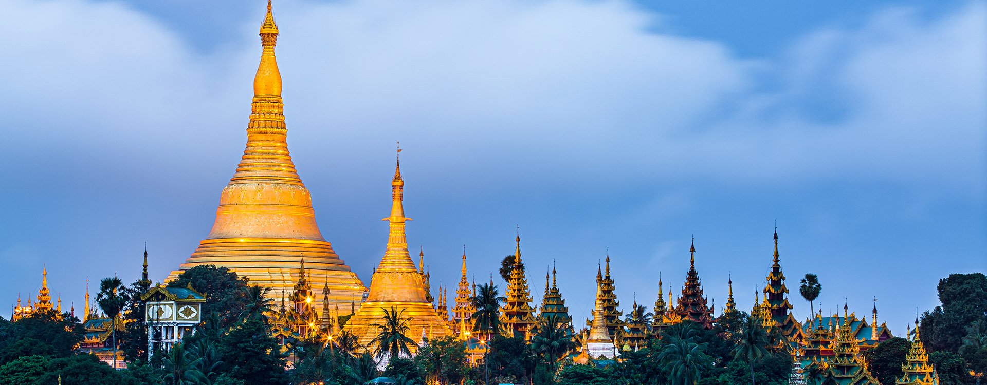 Shwedagon Pagoda in Yagon City with blue sky background, Yangon skyline in Myanmar