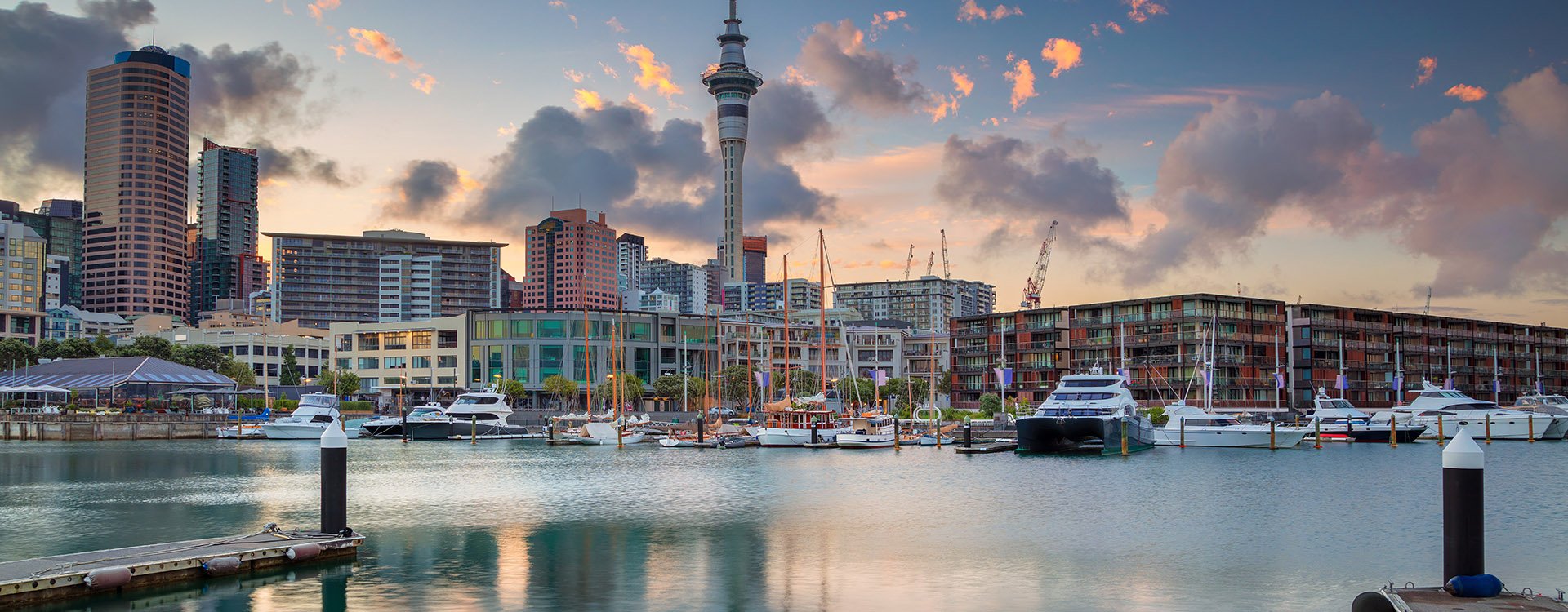 Cityscape image of Auckland skyline, New Zealand during sunrise