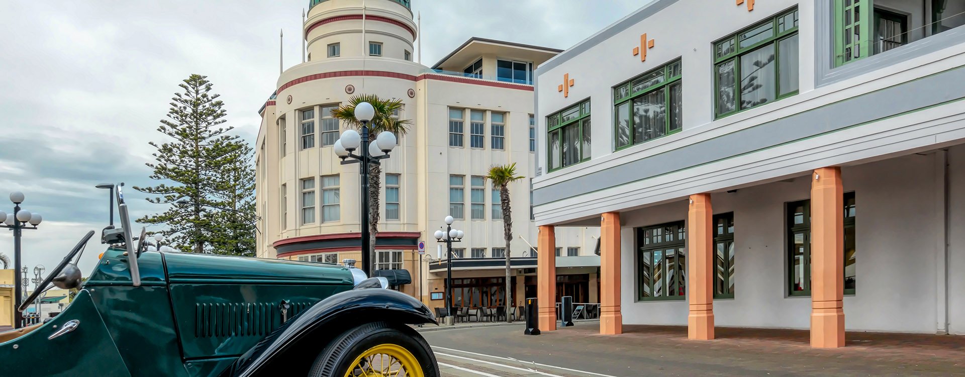 Napier, New Zealand Major Symbols - A Vintage Car and The Dome Building