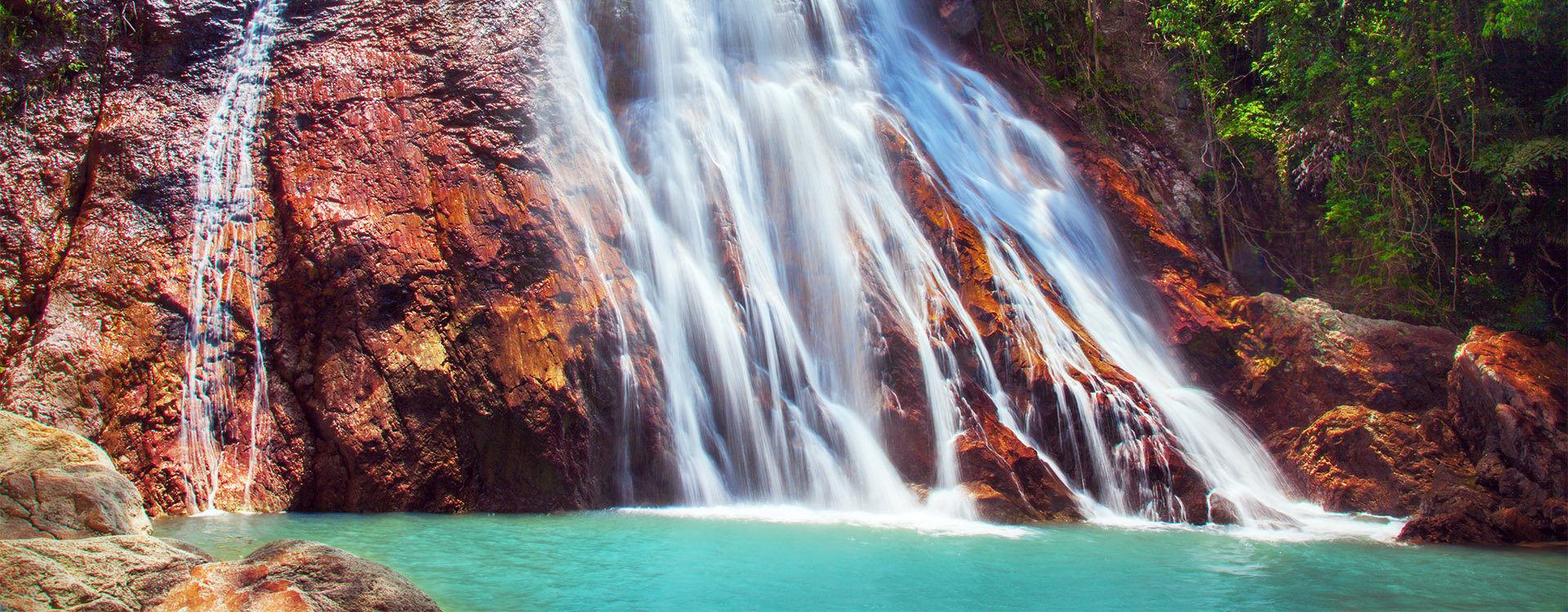 Na Muang 1 waterfall, Koh Samui, Thailand on a sunny day