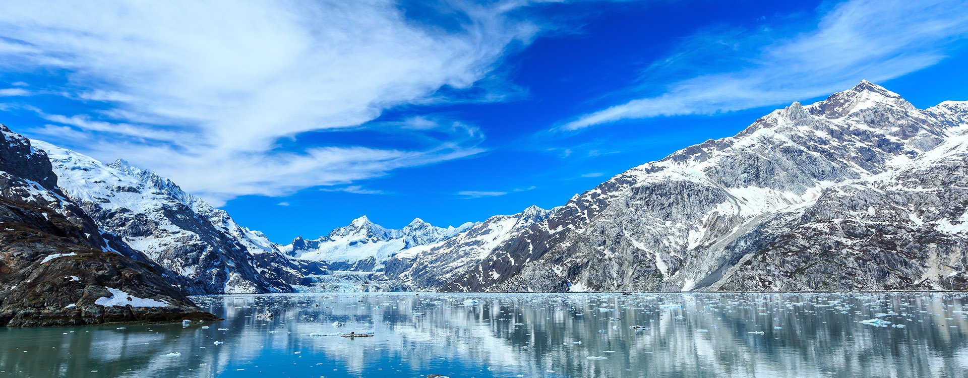 Panoramic view of Glacier Bay national Park. John Hopkins Glacier with Mount Orville and Mount Wilbur in the background. Alaska