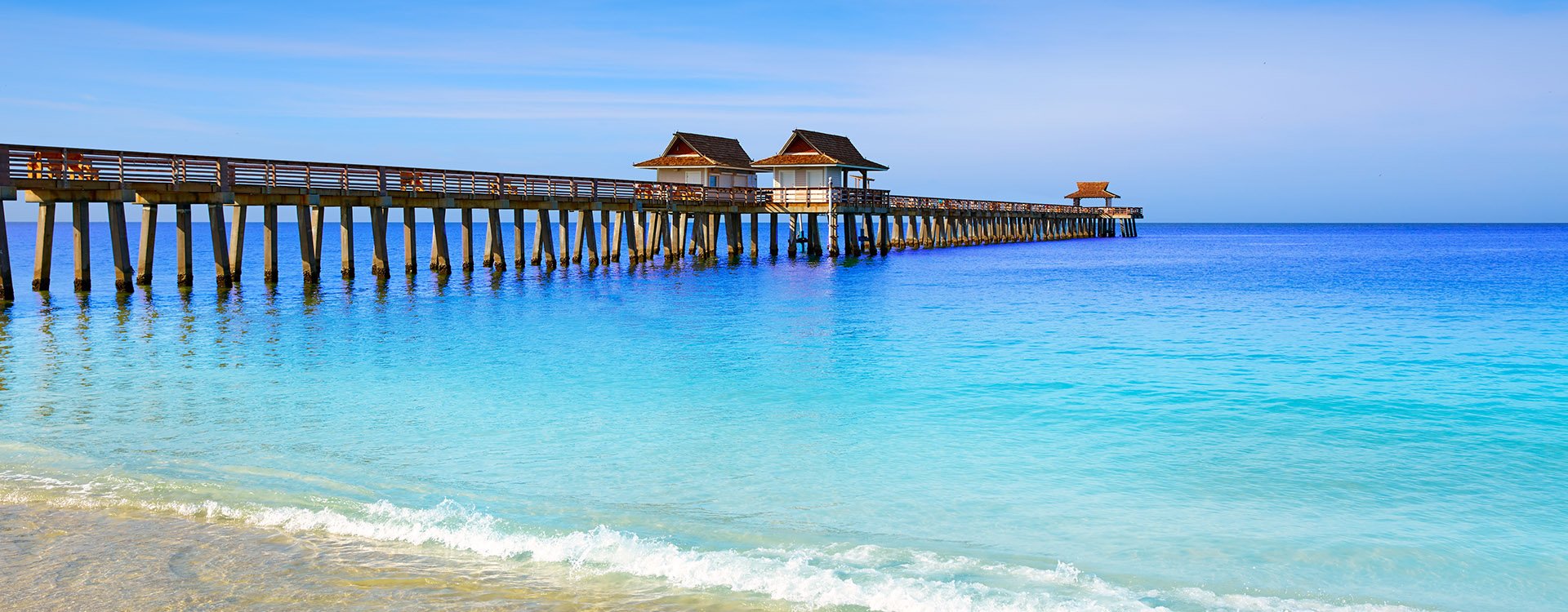 Naples Pier and beach in florida USA sunny day