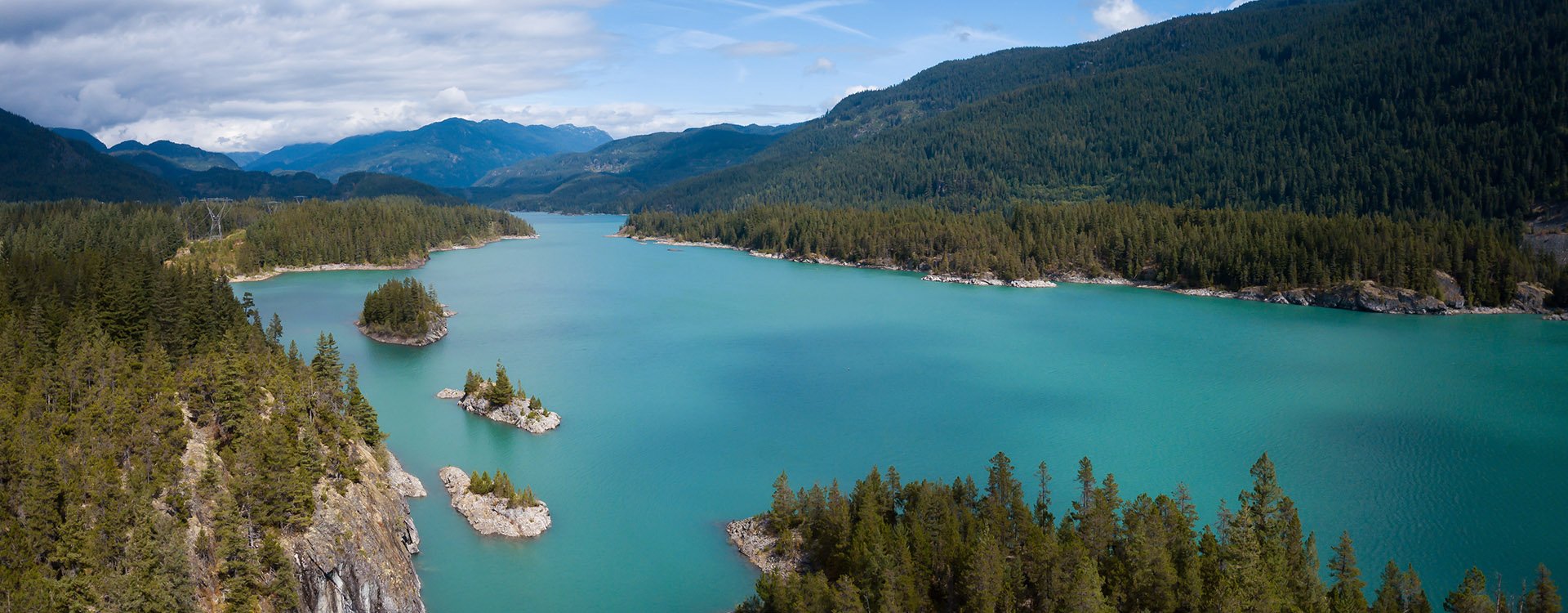 Aerial drone landscape view of Daisy Lake during a bright summer day. Taken between Squamish and Whistler, North of Vancouver, BC, Canada.