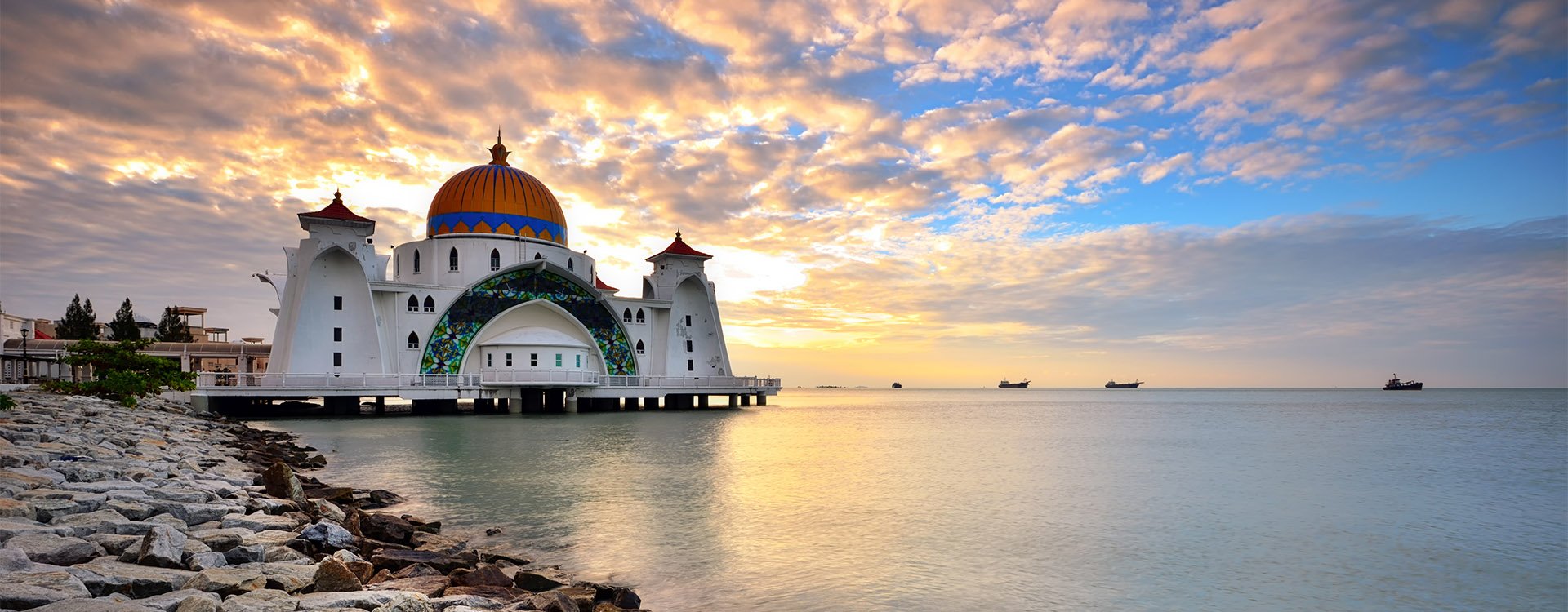 Malacca Straits Mosque (Masjid Selat Melaka) with sunset background