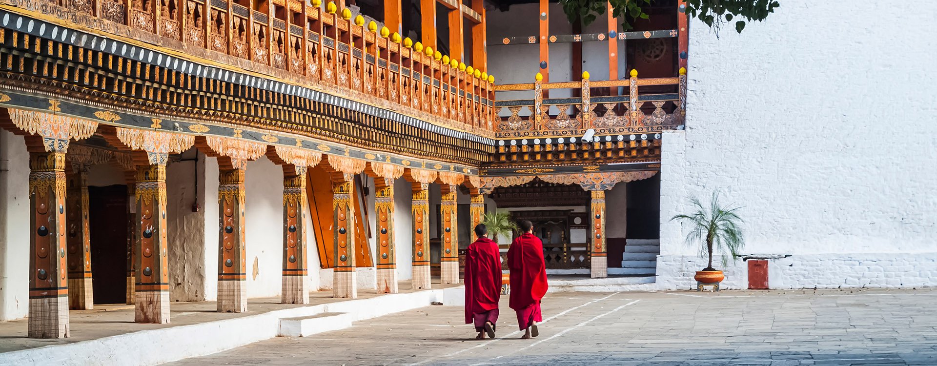 Two buddhist monks at Punakha Dzong, Bhutan