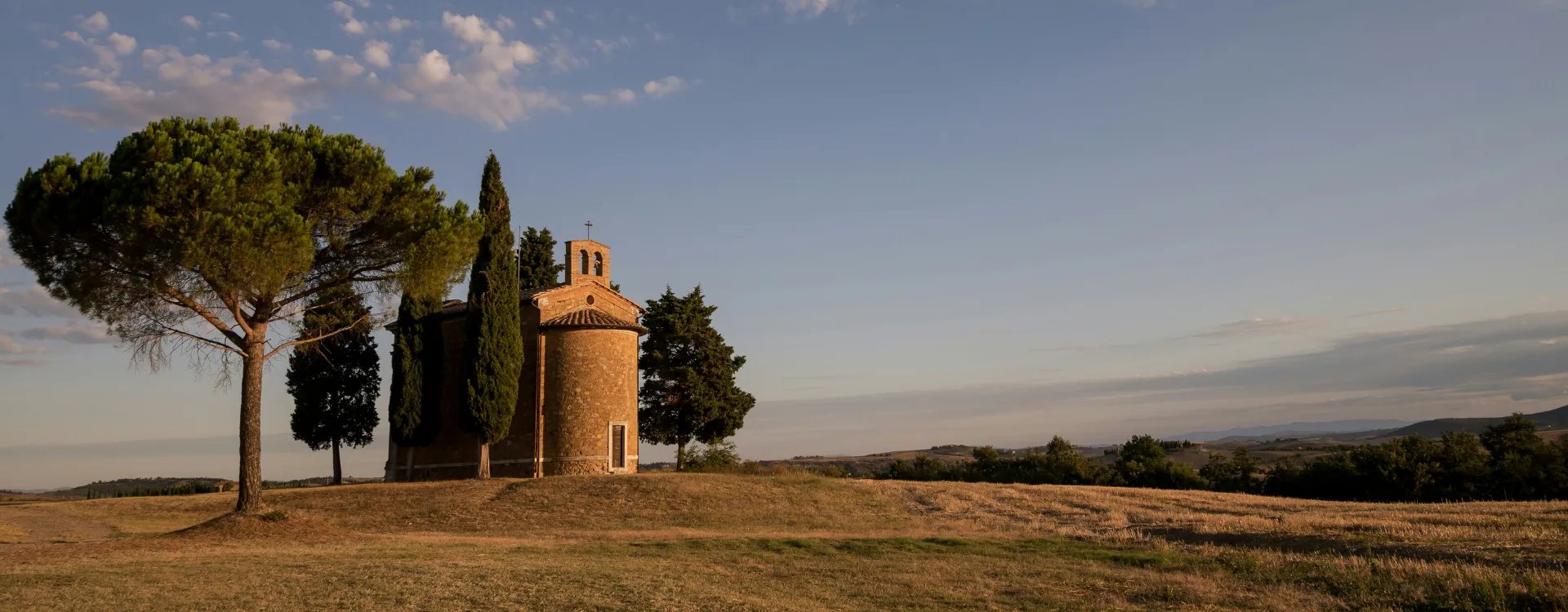 Old Italian ruin on a green pasture in Tuscany