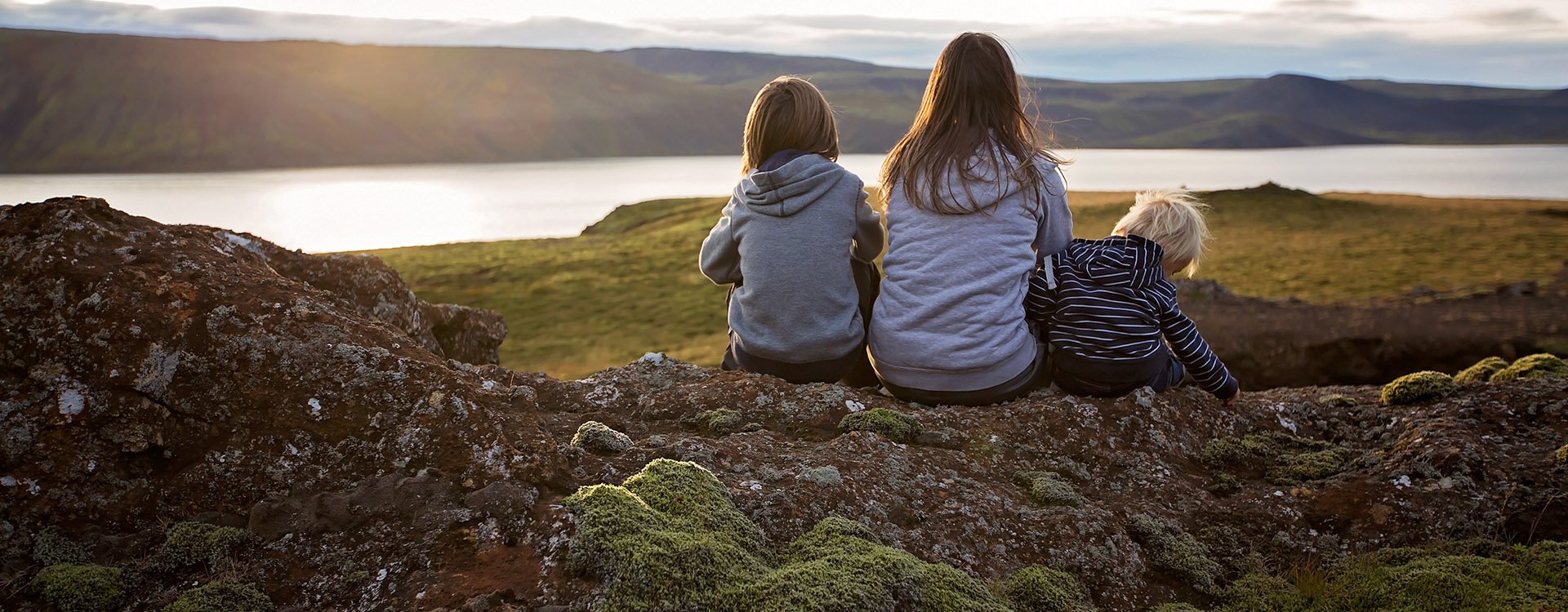 Family posing in Geothermal area in Reykjanesfolkvangur, Iceland, autumn time