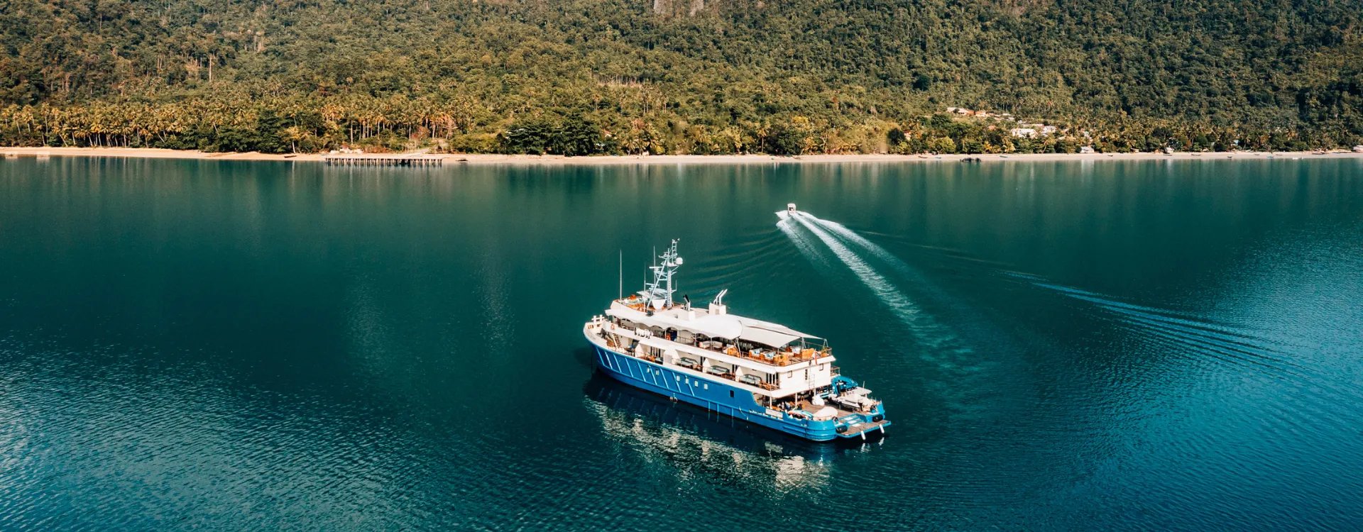 private yacht sailing pristine waters of East Indonesia