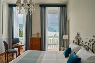 Spacious and stylish bedroom at the Grand Hotel Miramare