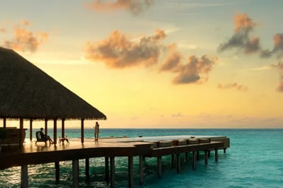 Sunset on a jetty at Heritance Aarah Maldives