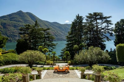 a view of lake como and mountains from passalacqua