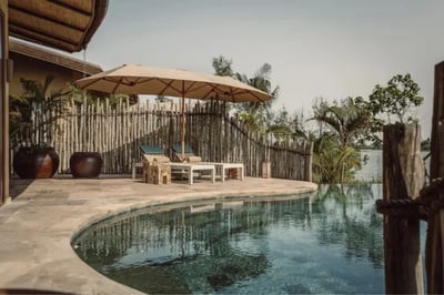 A pool villa at Namia River Retreat