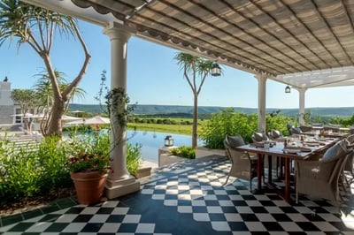A veranda overlooking a pool at the Shamwari Private Reserve South Africa