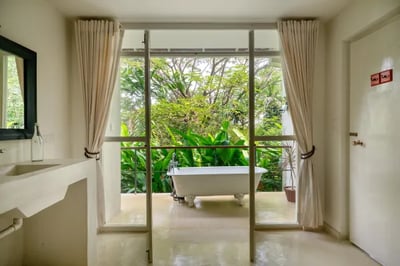 Outdoor bathtub at the beautiful Sun House in Galle, Sri Lanka