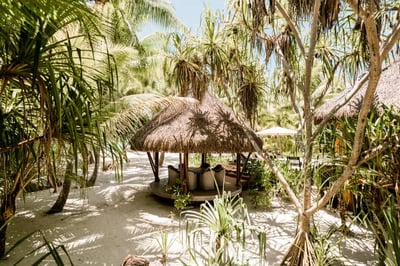 Outdoor beach seating at The Brando