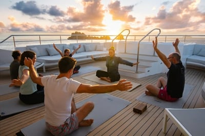 Yoga on deck on the Galapagos Tribute Yacht, Ecuador