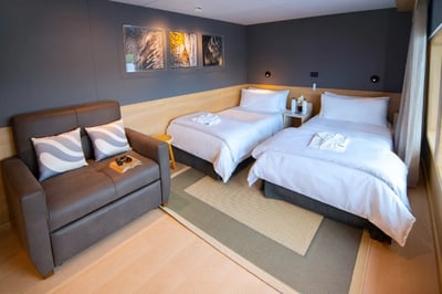 Twin bed set up on the Galapagos Tribute Yacht, Ecuador