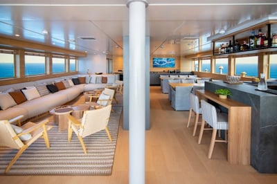 Interior living and dining area on the Galapagos Tribute Yacht, Ecuador