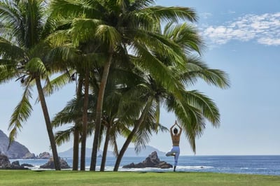 Yoga on the beach at Four Seasons Tamarindo, Pacific Coast Mexico