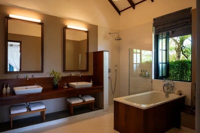 modern bathroom with views of a vineyard