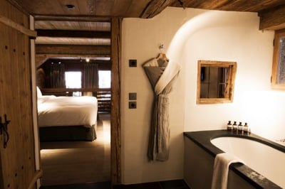 Bathroom leading onto main bedroom at zannier le chalet