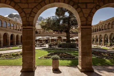 Green courtyard at hotel Belmond Monesterio Cusco