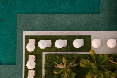 aerial image of a pool and sun loungers